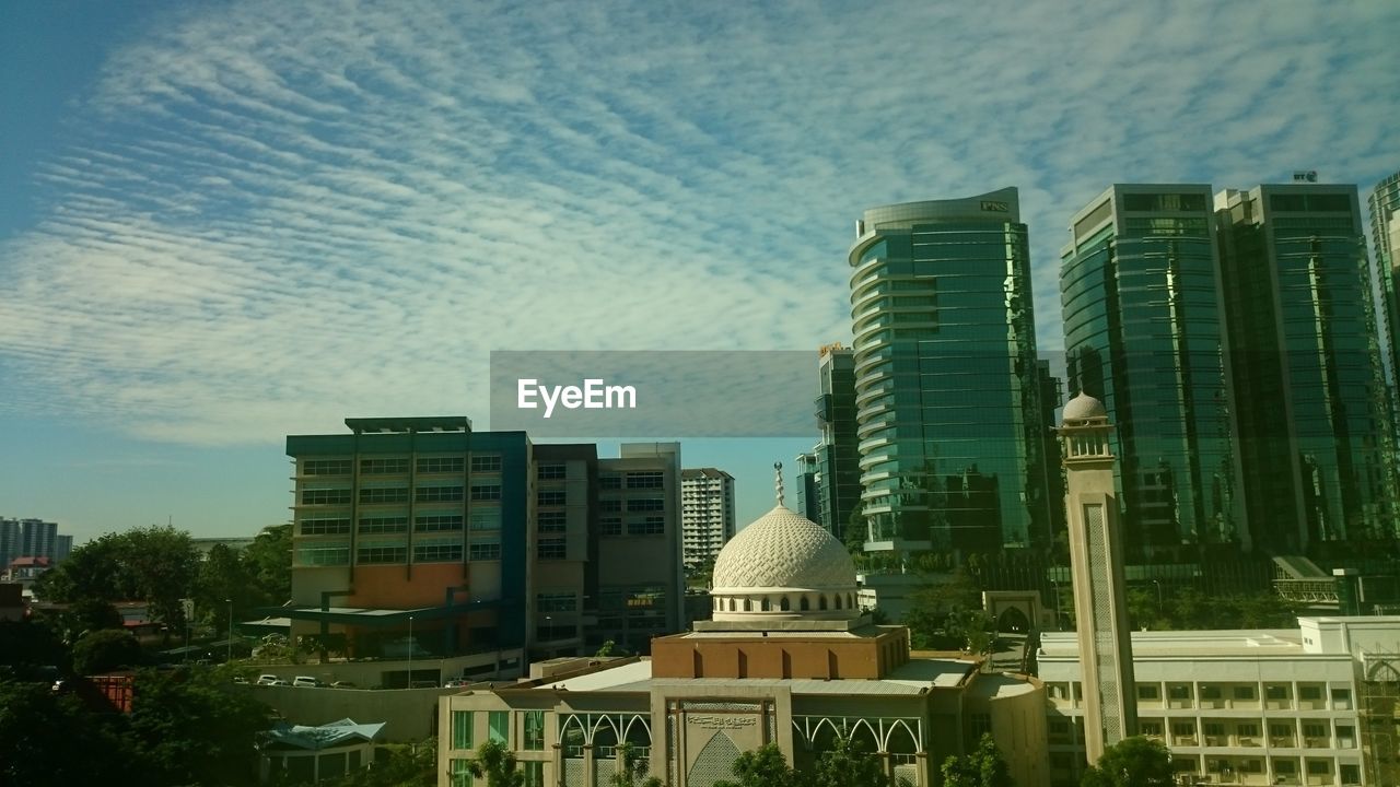 Modern cityscape against sky