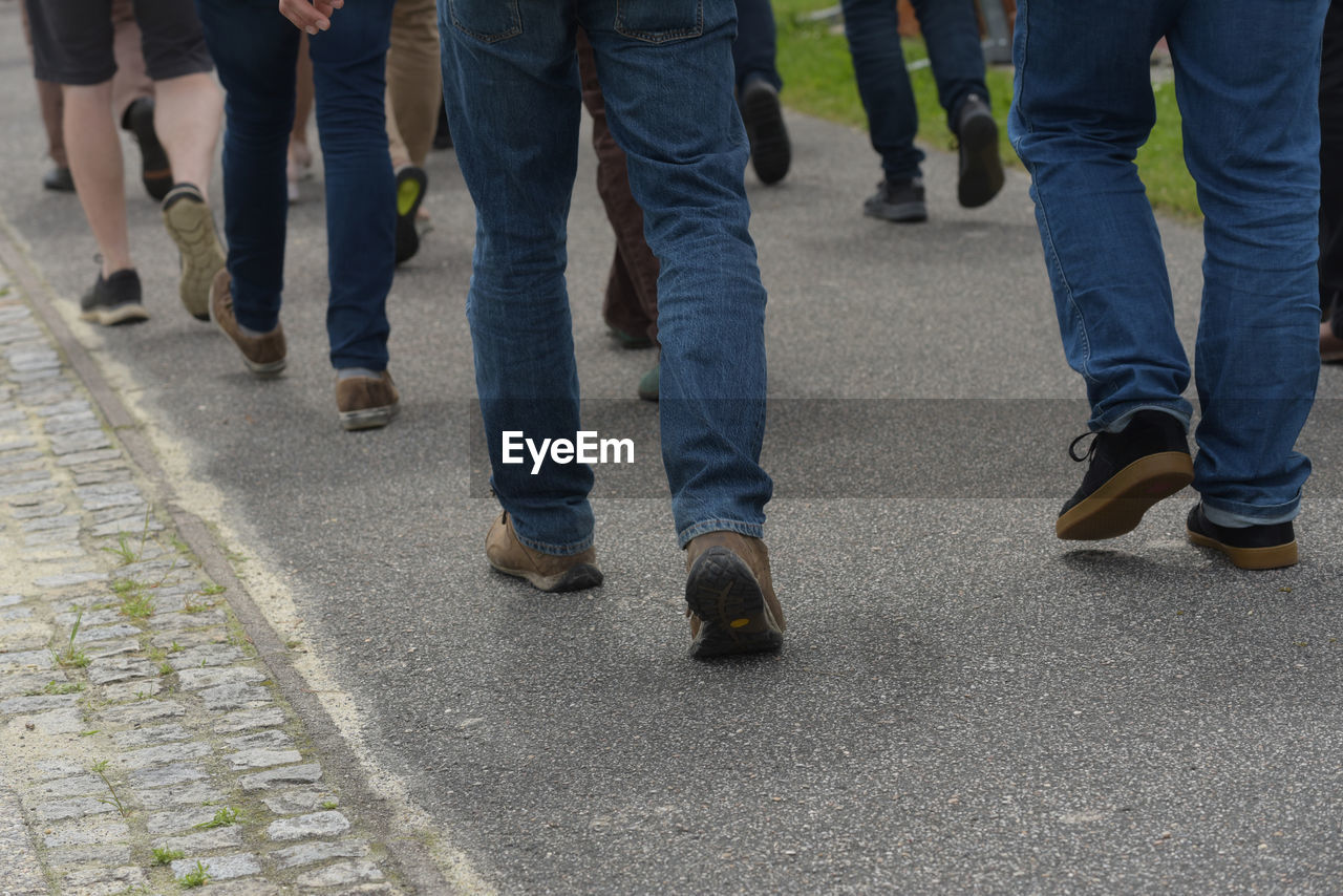 A group of people being together, spectator at an event