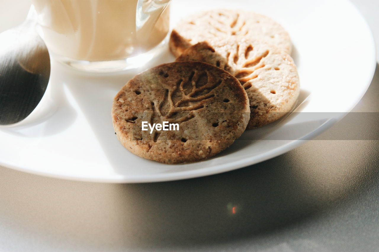 Close-up of cookies in plate on table