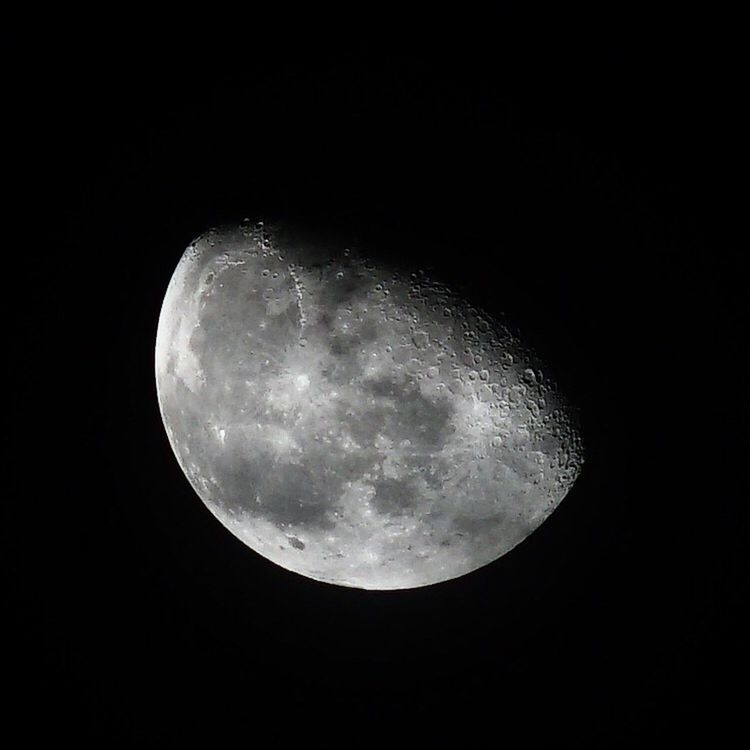 LOW ANGLE VIEW OF MOON IN SKY AT NIGHT