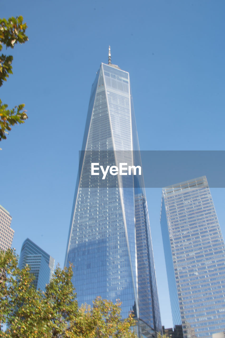 LOW ANGLE VIEW OF BUILDINGS AGAINST CLEAR SKY