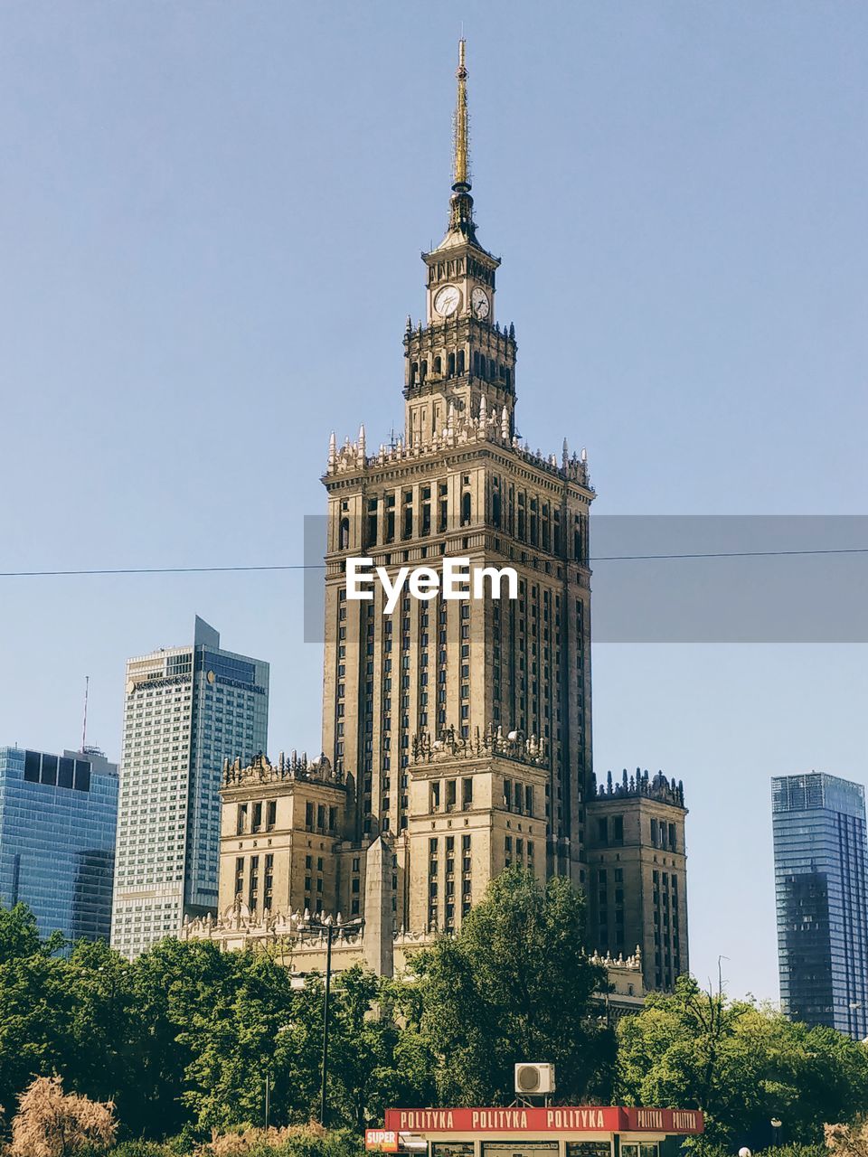 Low angle view of building against clear sky during sunny day