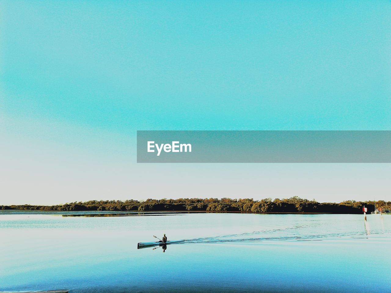 SCENIC VIEW OF LAKE AGAINST SKY DURING WINTER