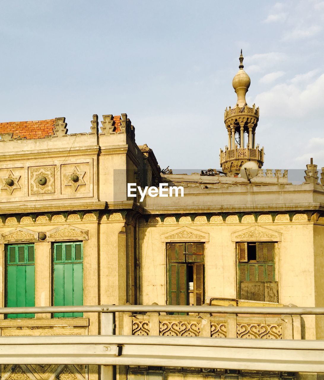 Exterior of historic mosque against sky