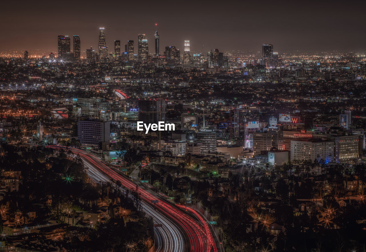 High angle view of illuminated cityscape at night