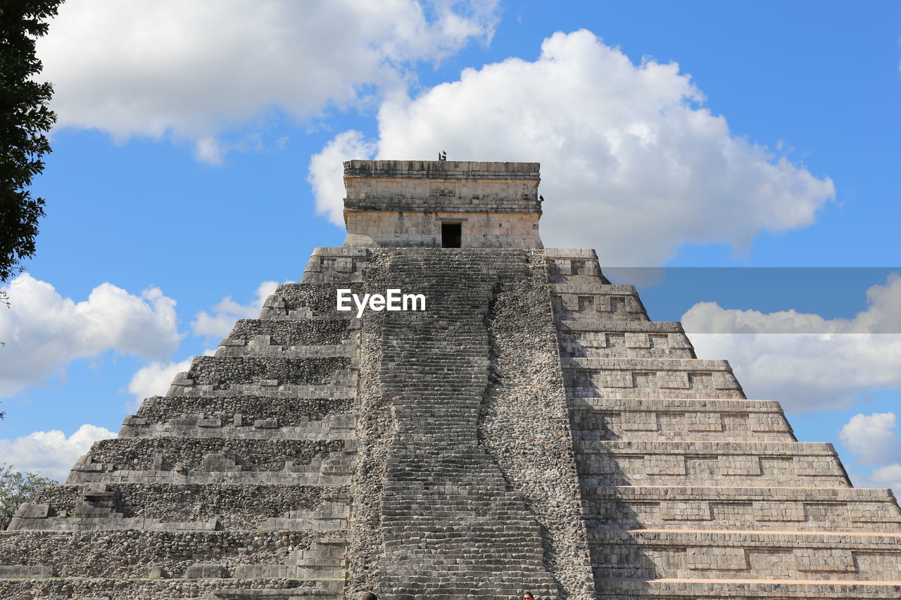 Low angle view of old ruins against sky