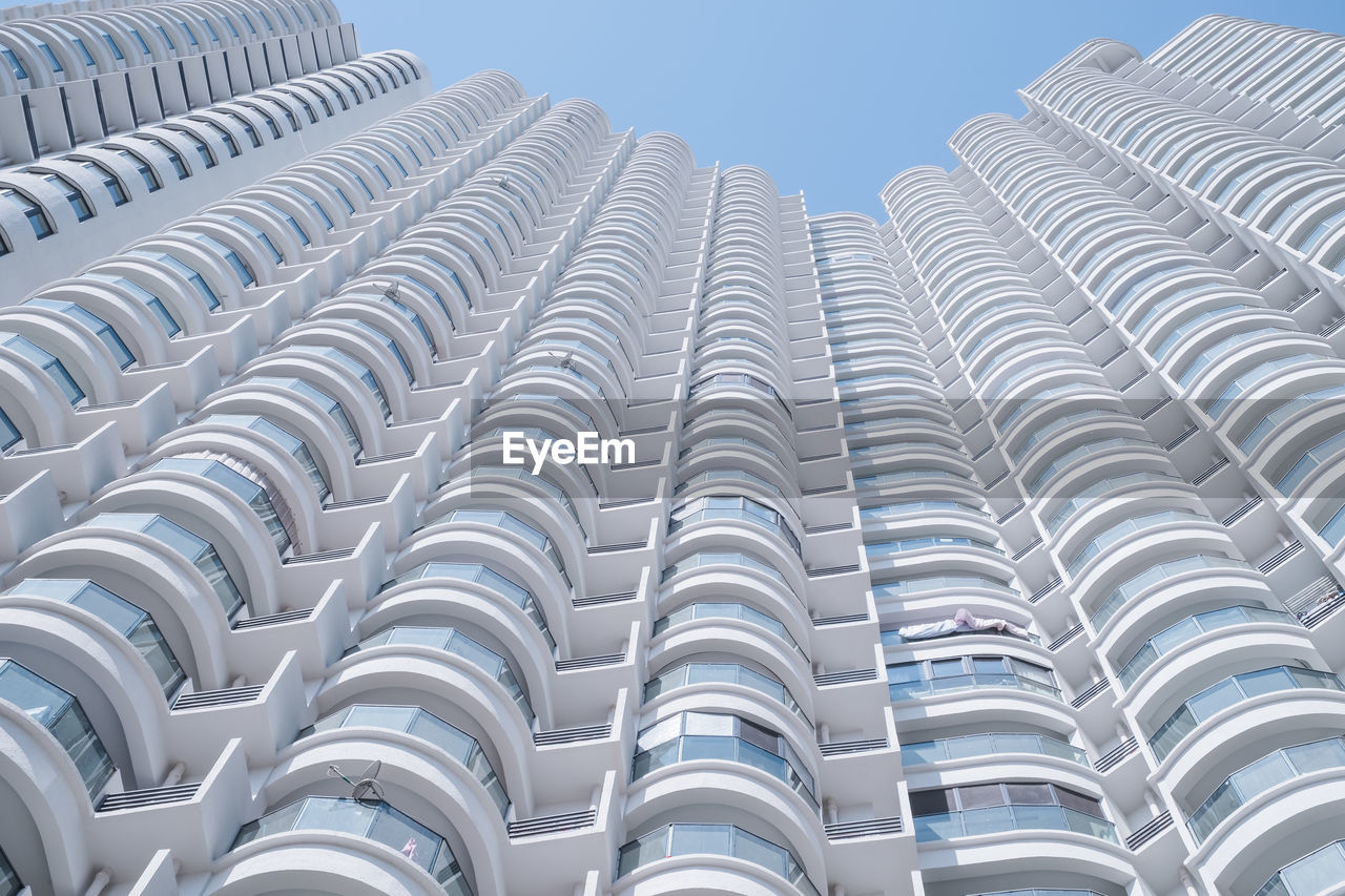 Low angle view of modern building against sky