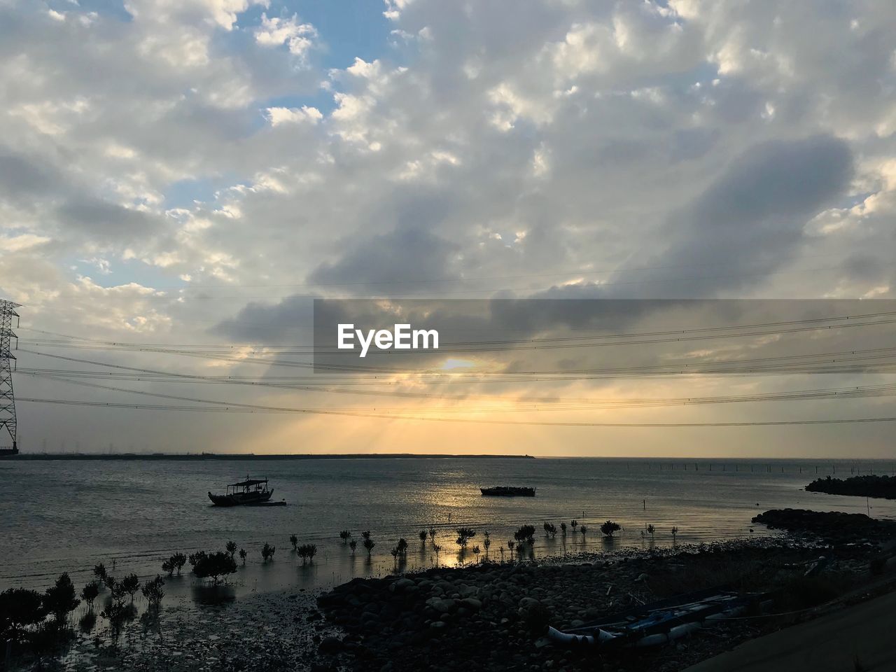 SCENIC VIEW OF SEA DURING SUNSET