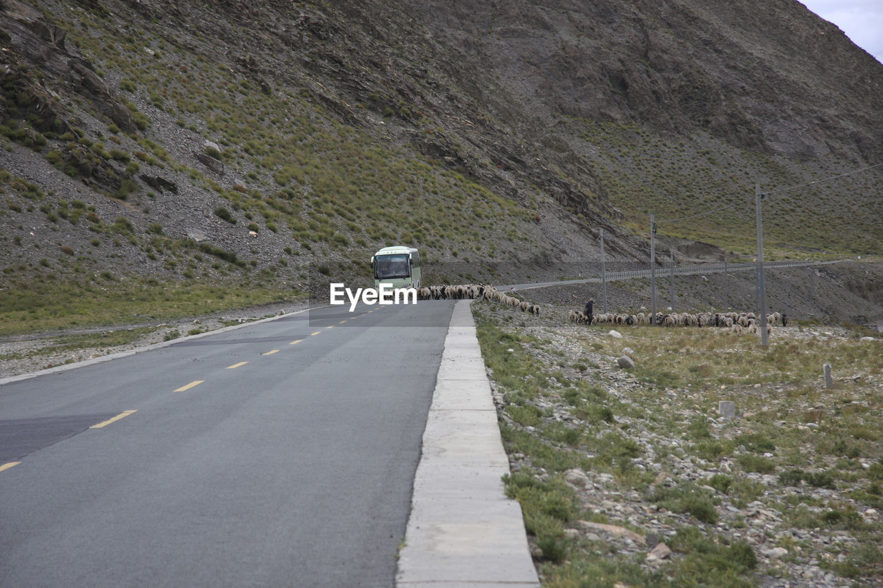 Road leading towards mountain