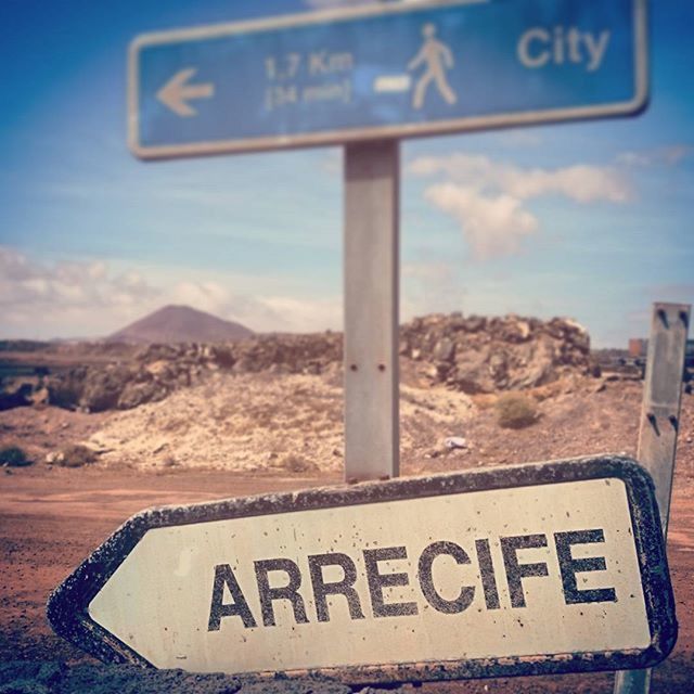 LOW ANGLE VIEW OF SIGNBOARD