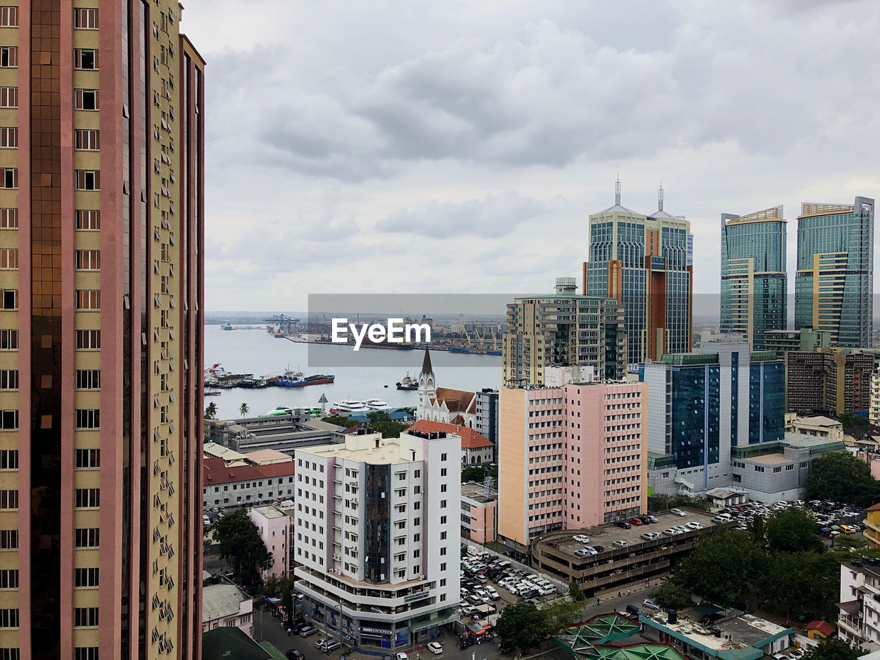 High angle view of buildings in city against sky