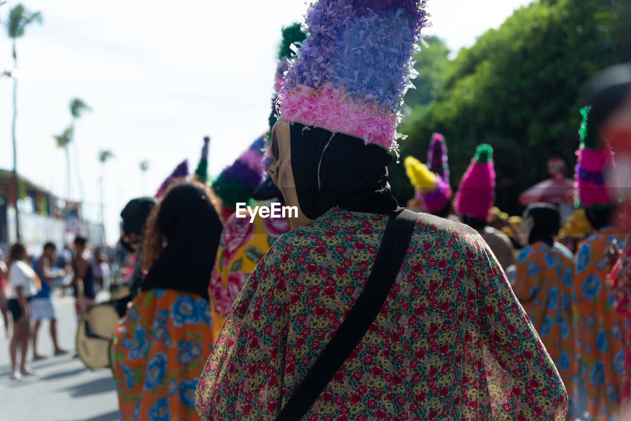 Traditional cultural group is seen performing during the fuzue pre-carnival parade 