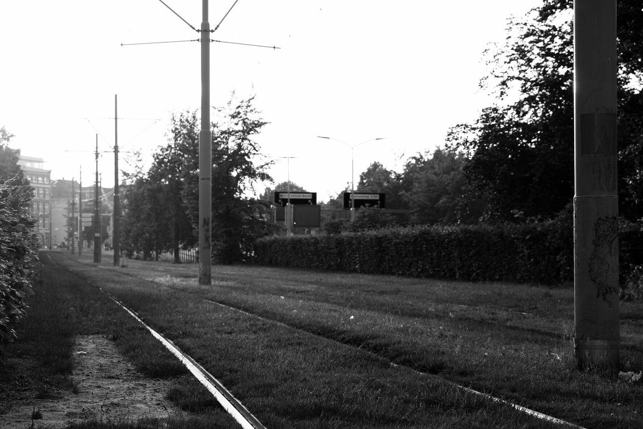 View of railroad tracks against clear sky