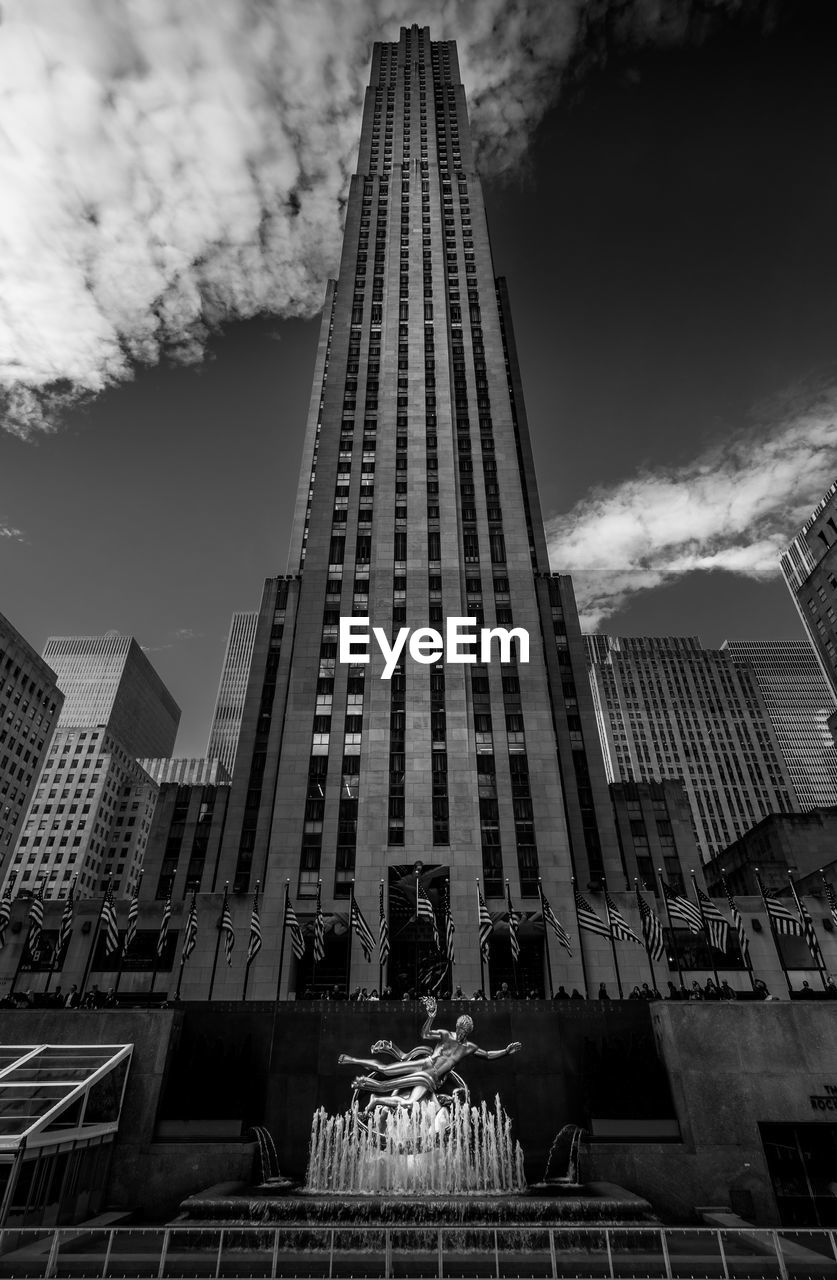 LOW ANGLE VIEW OF MODERN BUILDINGS AGAINST SKY