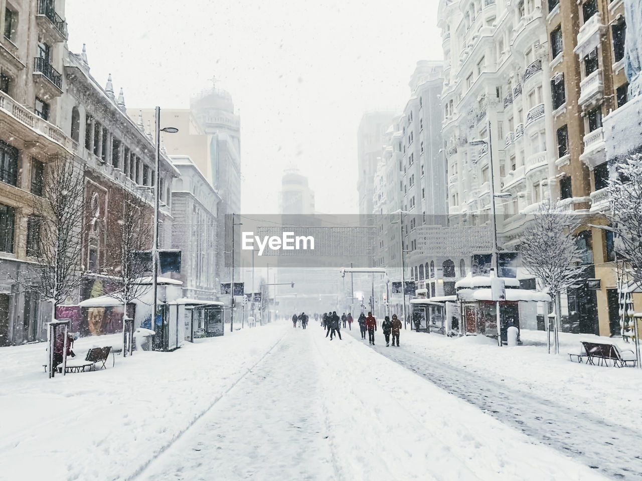 Panoramic view of city street during winter