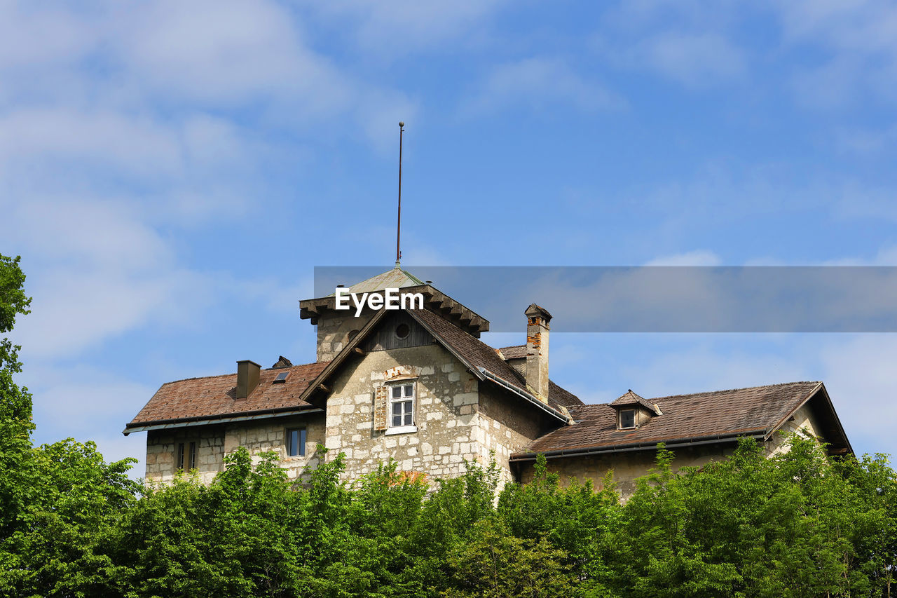 low angle view of buildings in city against sky