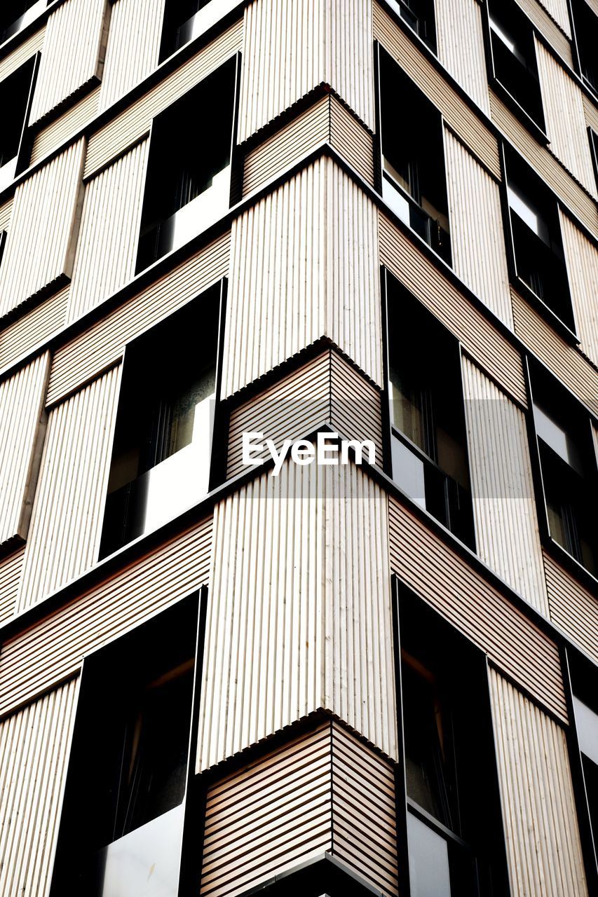 Low angle view of modern building against sky