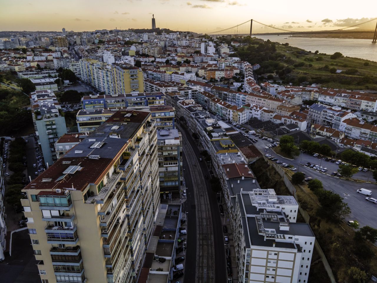 HIGH ANGLE VIEW OF CITY STREET AMIDST BUILDINGS