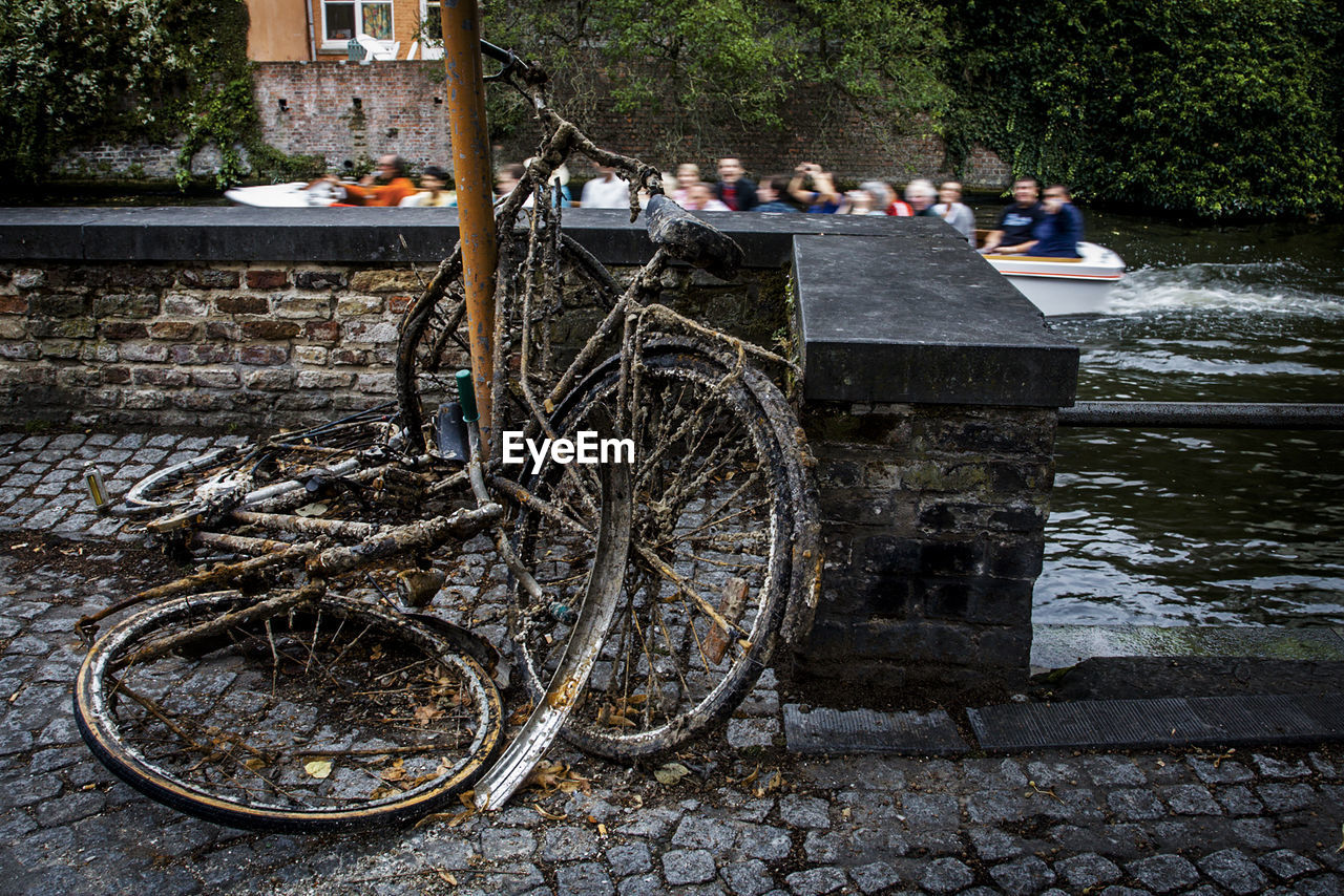 Abandoned bicycles by retaining wall