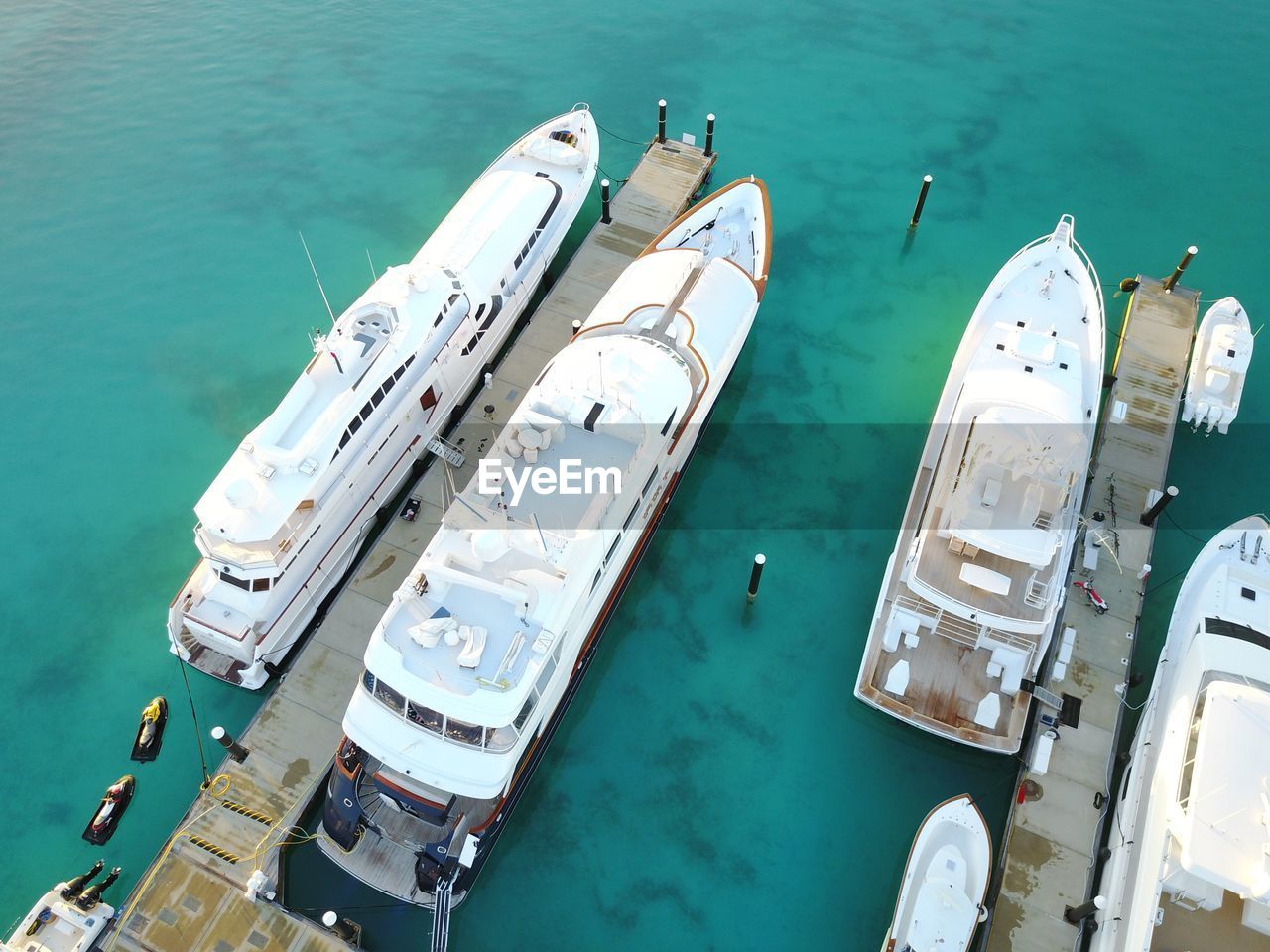 HIGH ANGLE VIEW OF SHIP MOORED AT SEA