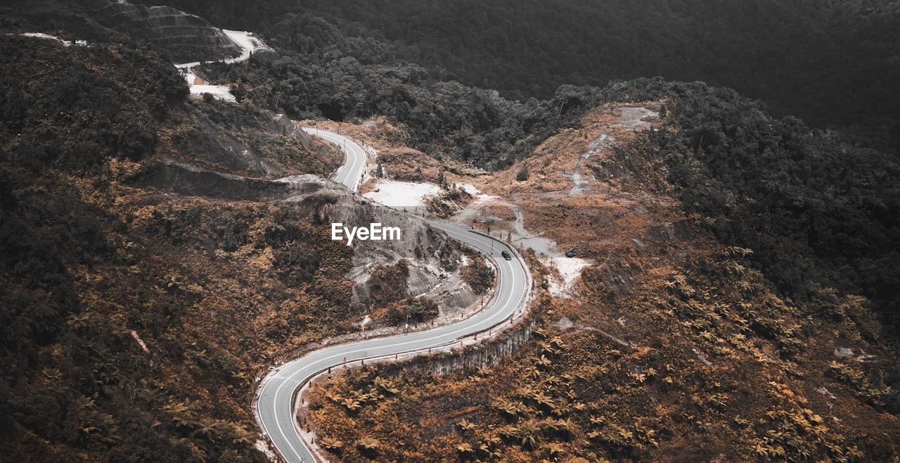 High angle view of winding road on mountain