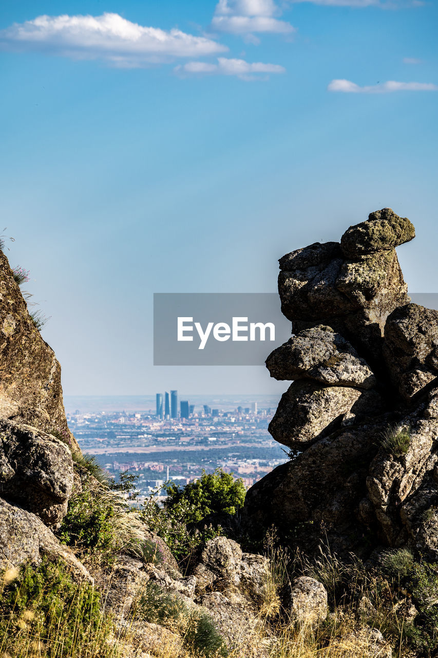 VIEW OF ROCK FORMATION ON LANDSCAPE AGAINST SKY