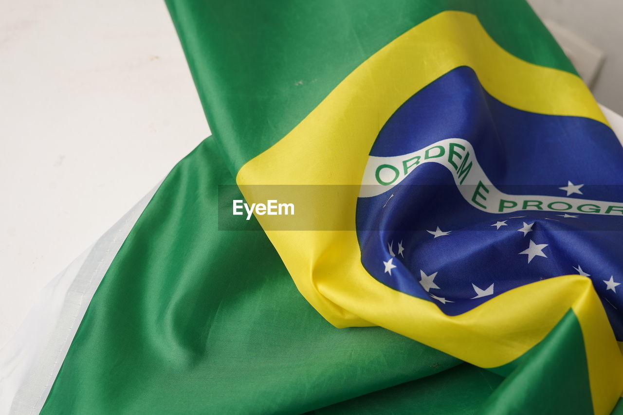 yellow, green, blue, flag, no people, clothing, textile, close-up
