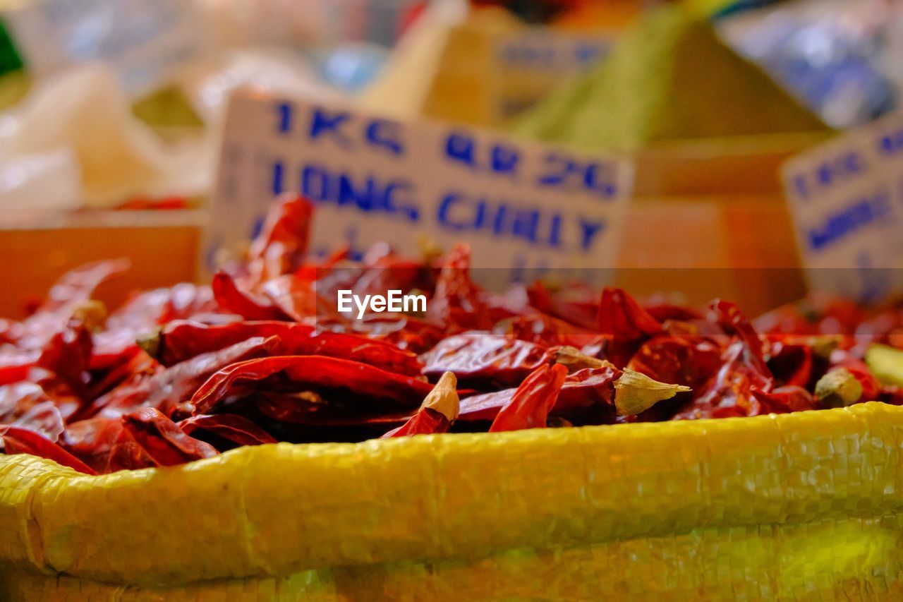 Close-up of red chilis for sale at market stall