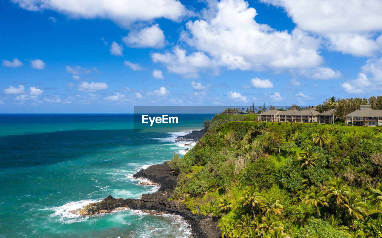 Aerial panoramic image off the coast over princeville and the kenomene ocean overlook on  kauai