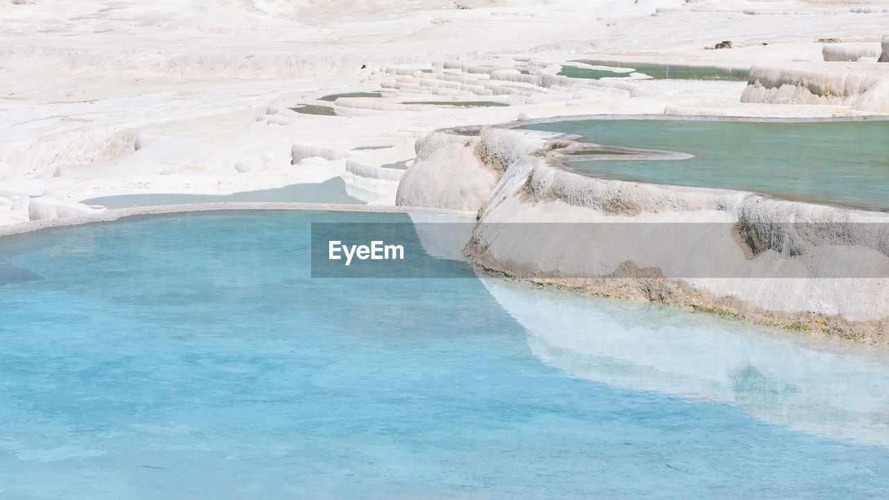 Natural travertine pools and terraces in pamukkale at turkey. 