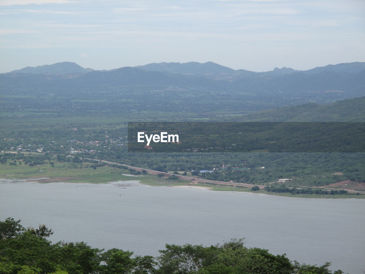 HIGH ANGLE VIEW OF LANDSCAPE AND MOUNTAINS AGAINST SKY