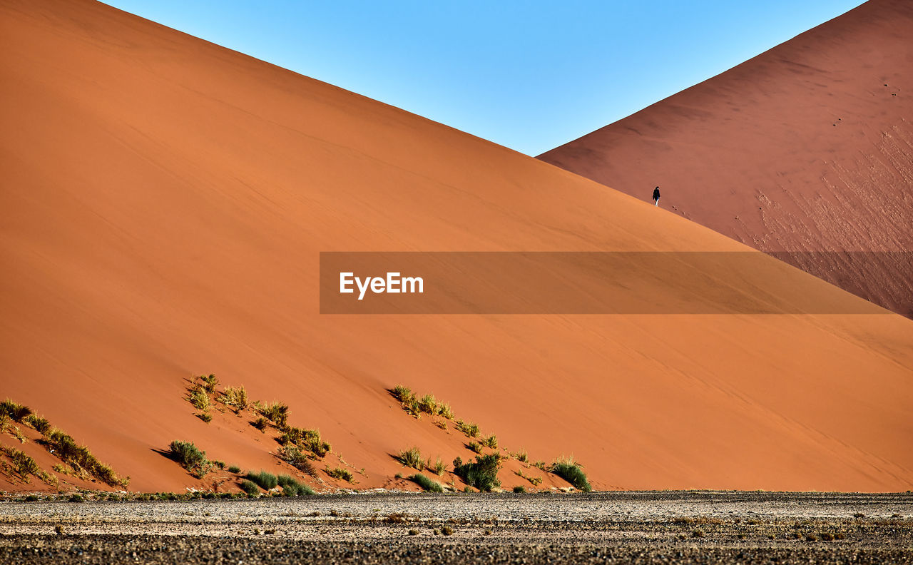 VIEW OF SAND DUNES IN DESERT