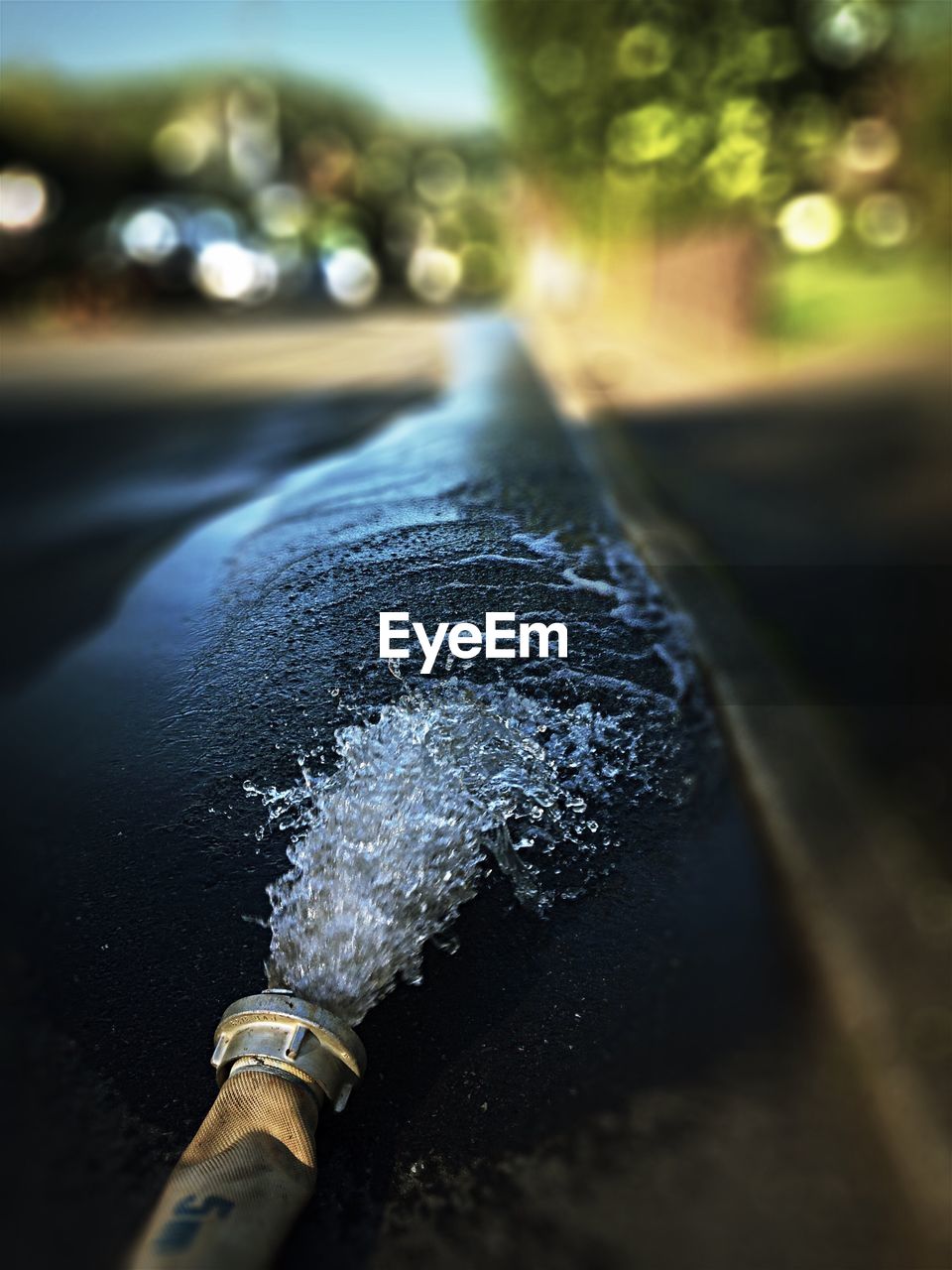 Close-up of water flowing on road