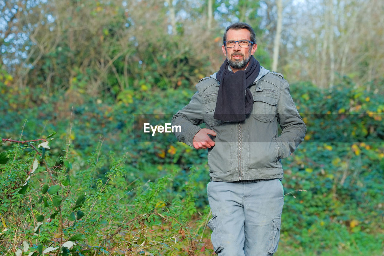 Portrait of a man standing on land