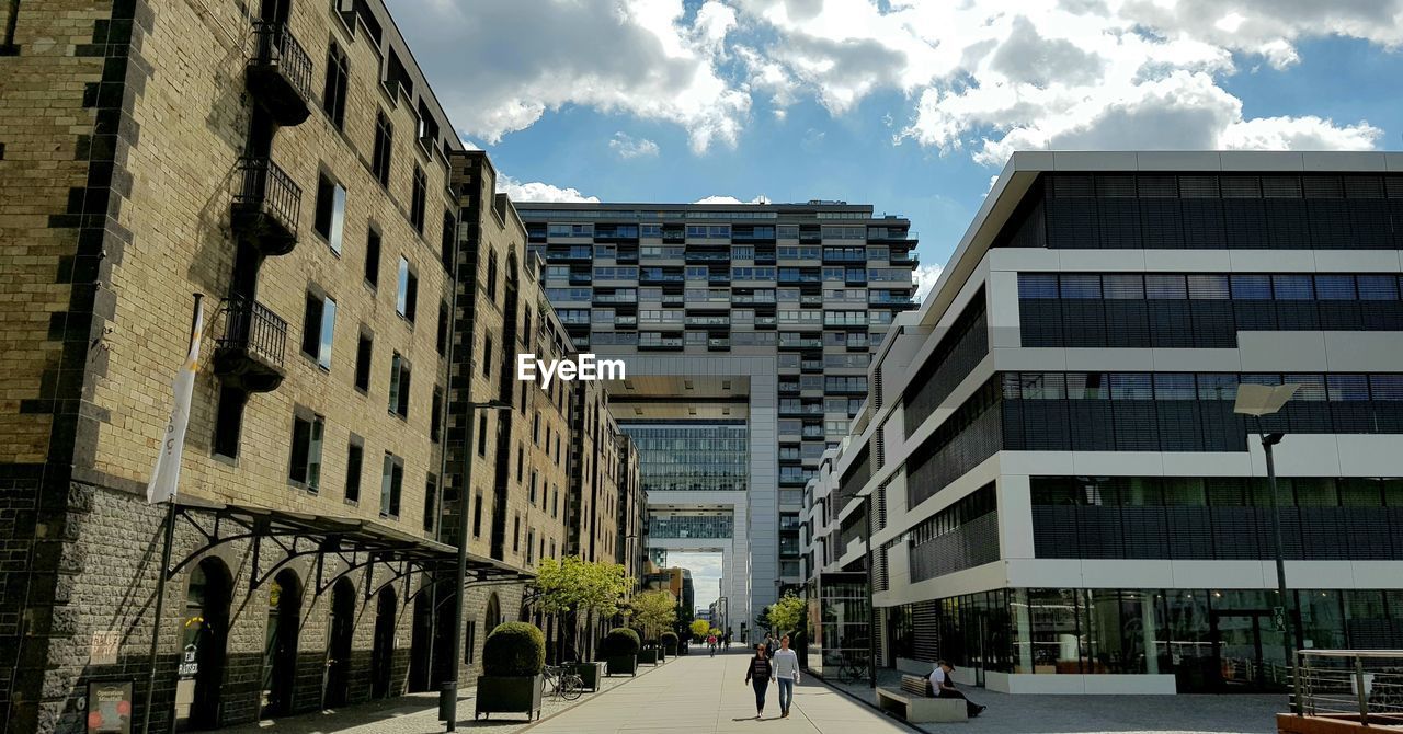 BUILDINGS IN CITY AGAINST SKY