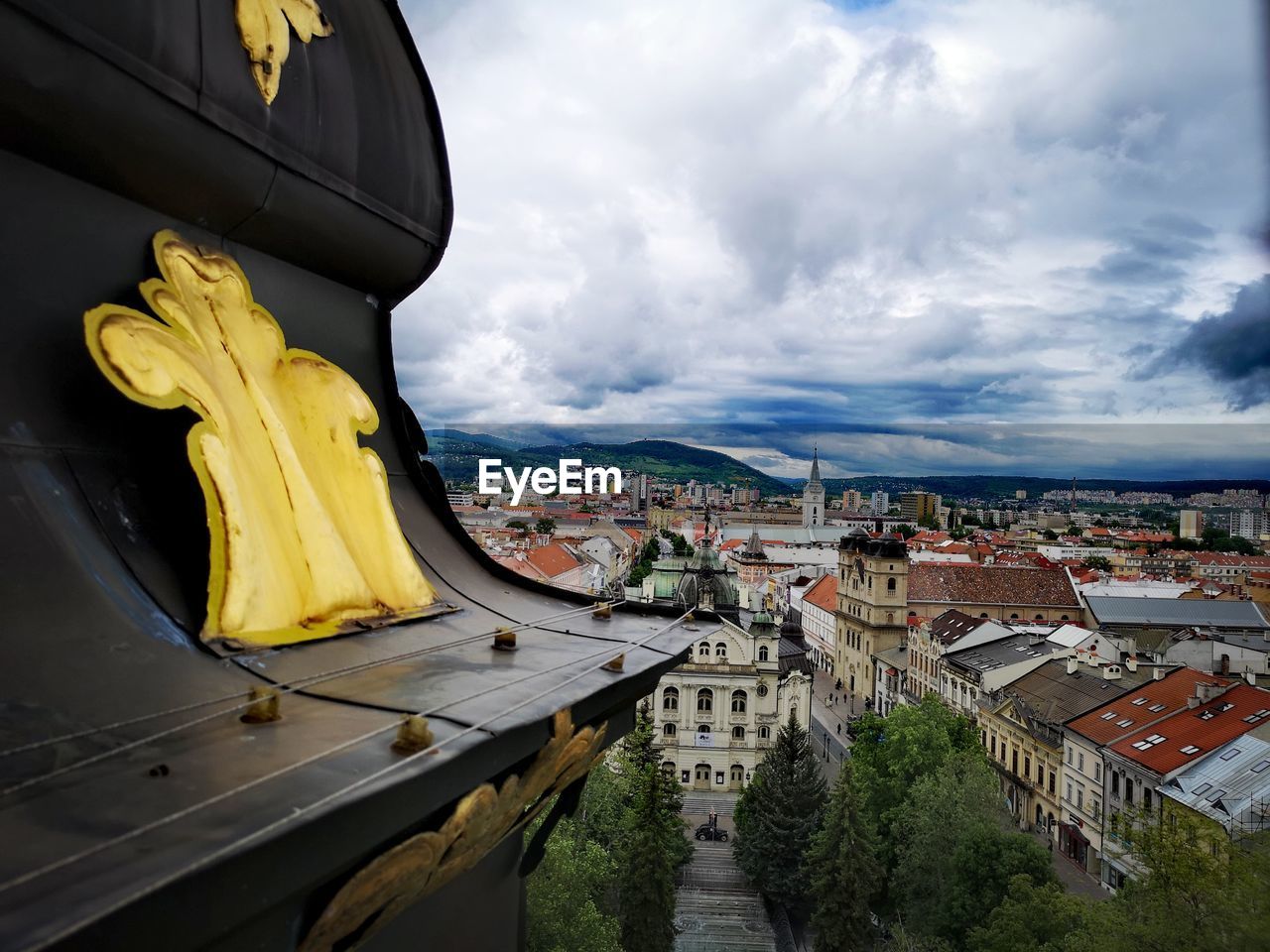 Panoramic view of buildings in city against sky