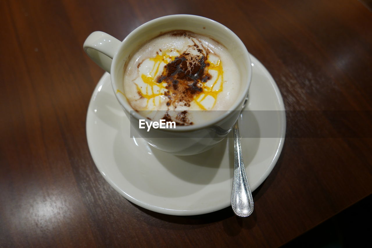 High angle view of fresh coffee on table