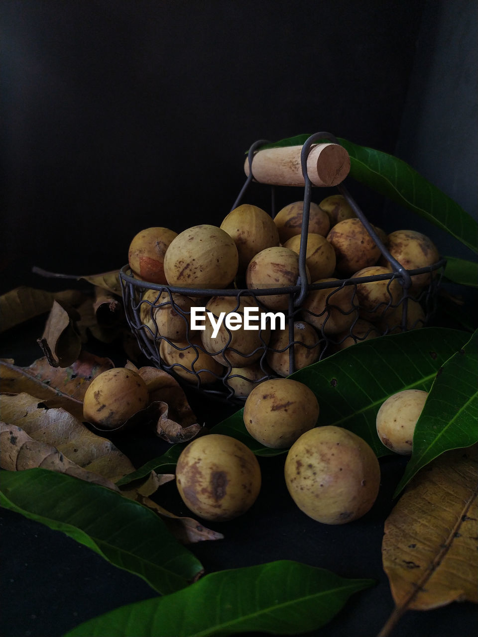 High angle view of pomegranate in basket