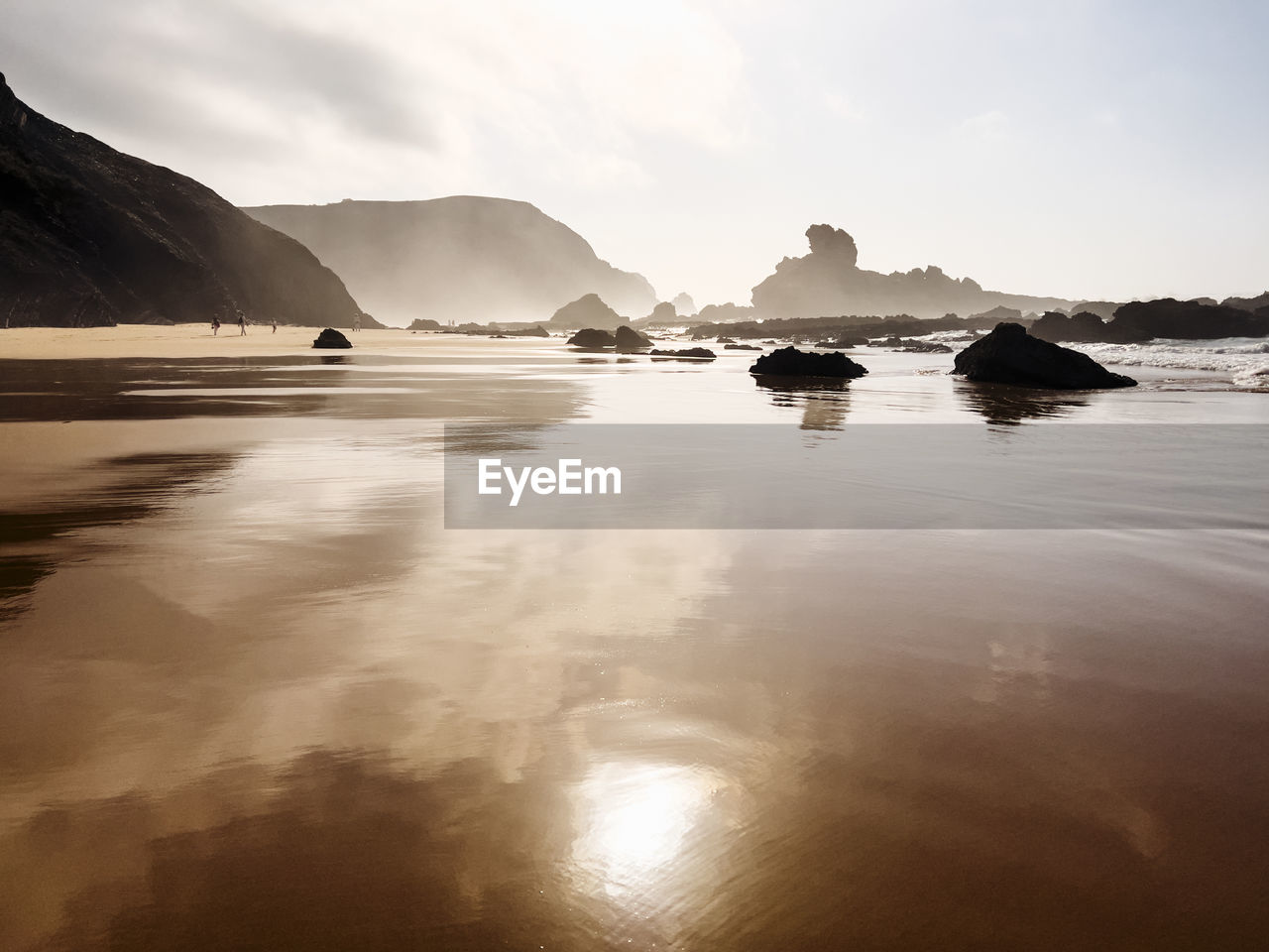 scenic view of sea against sky at sunset