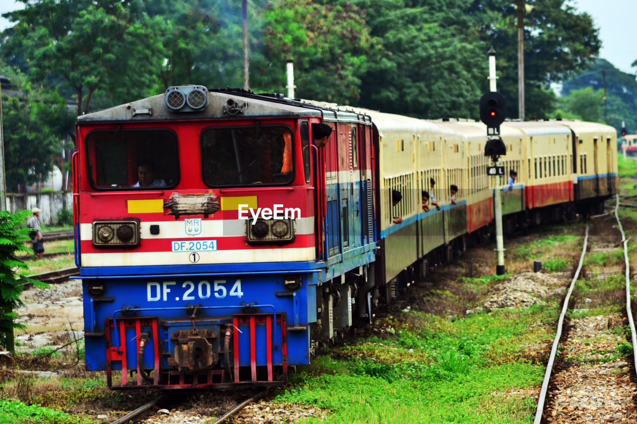 TRAIN ON RAILROAD TRACKS