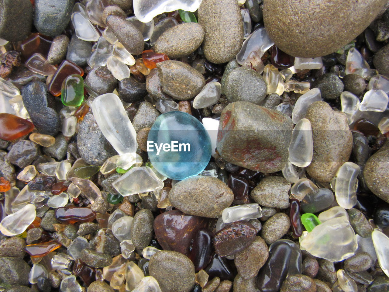 Full frame shot of pebbles on field