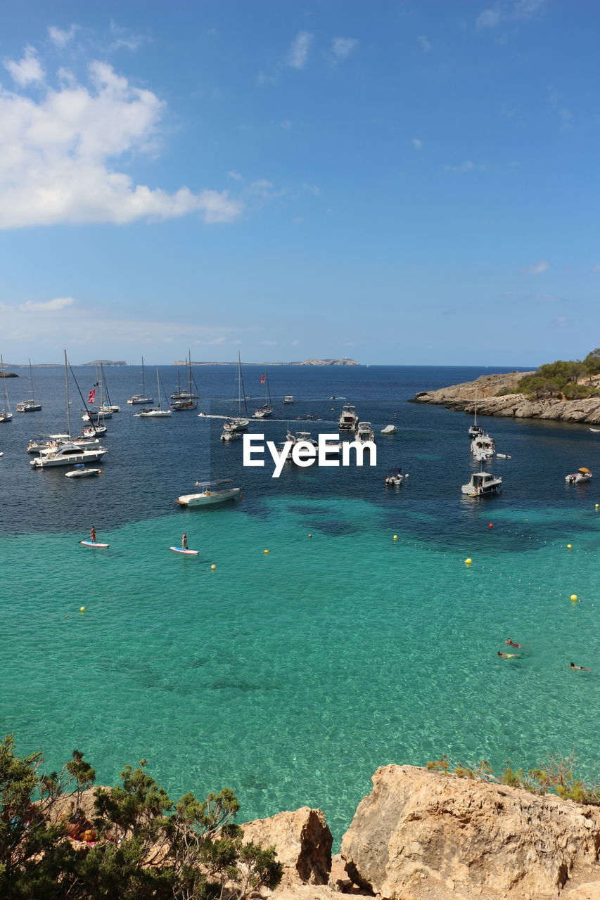 Boats sailing in sea