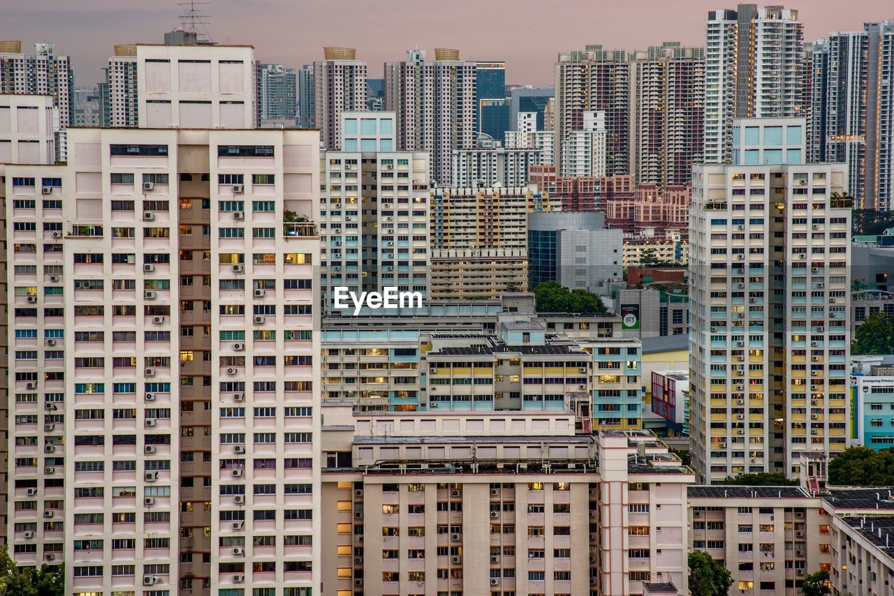 Buildings in city against sky