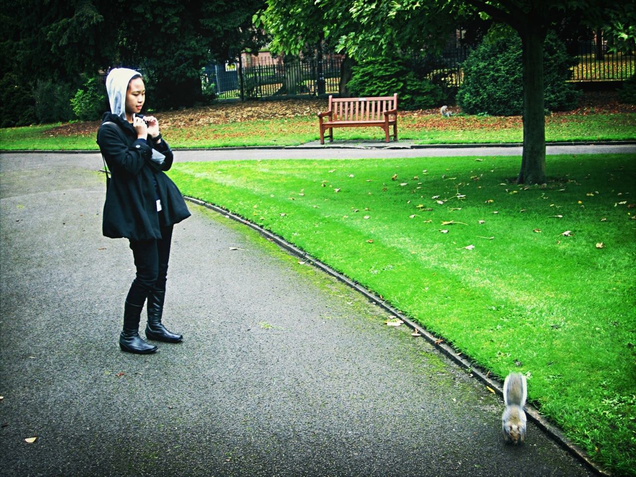 WOMAN WALKING ON ROAD