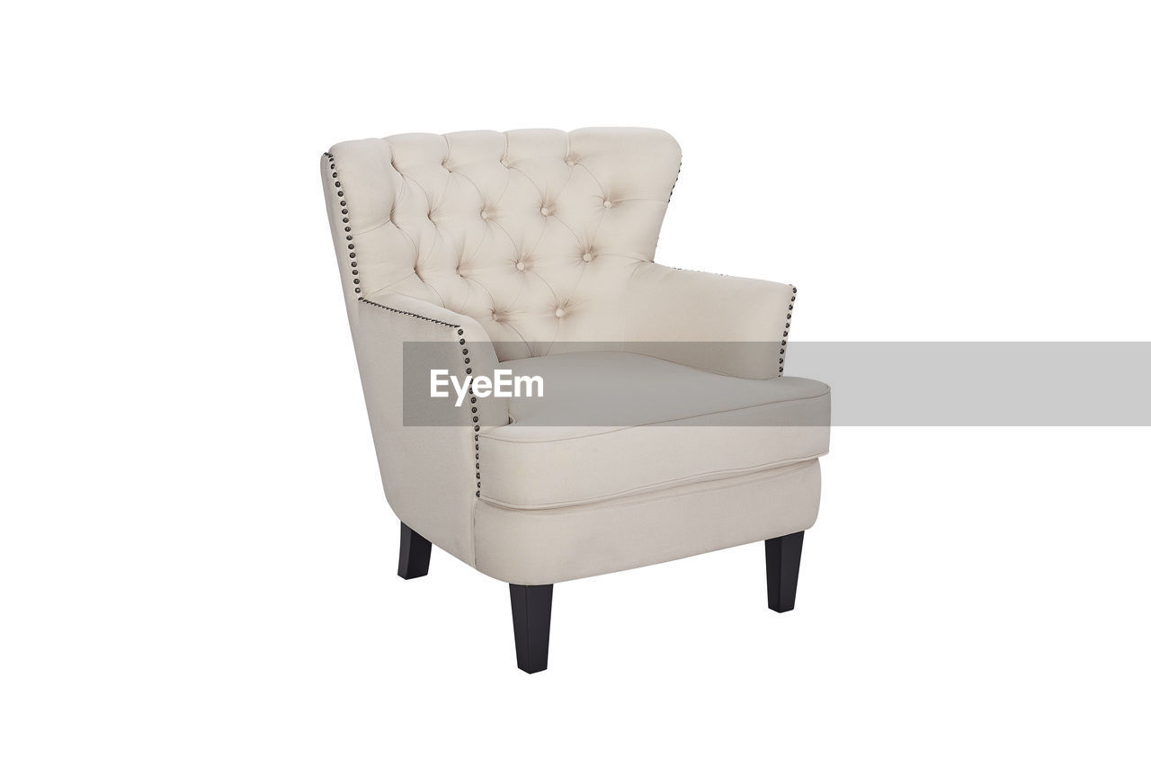 HIGH ANGLE VIEW OF CHAIR AGAINST WHITE BACKGROUND