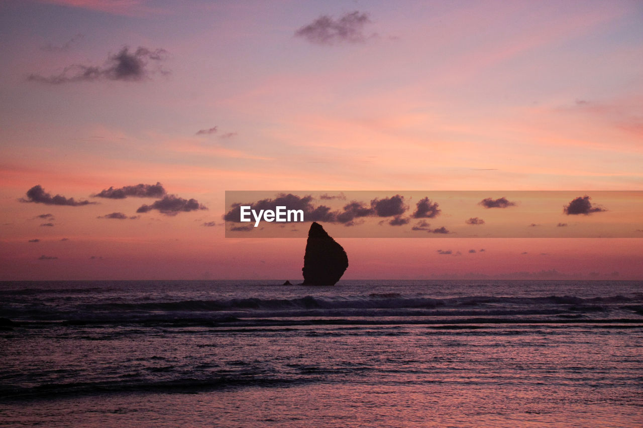 SCENIC VIEW OF SEA DURING SUNSET