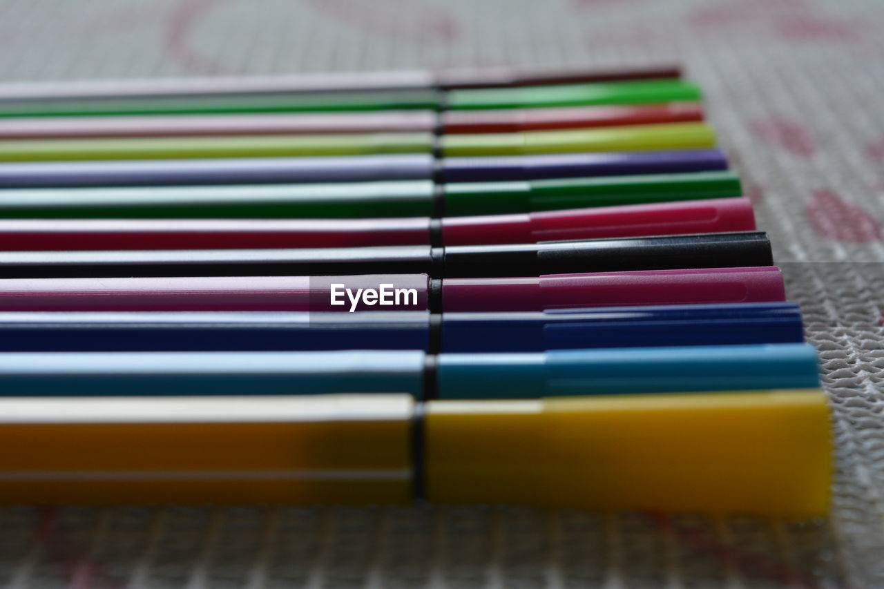 High angle view of multi colored pencils on table