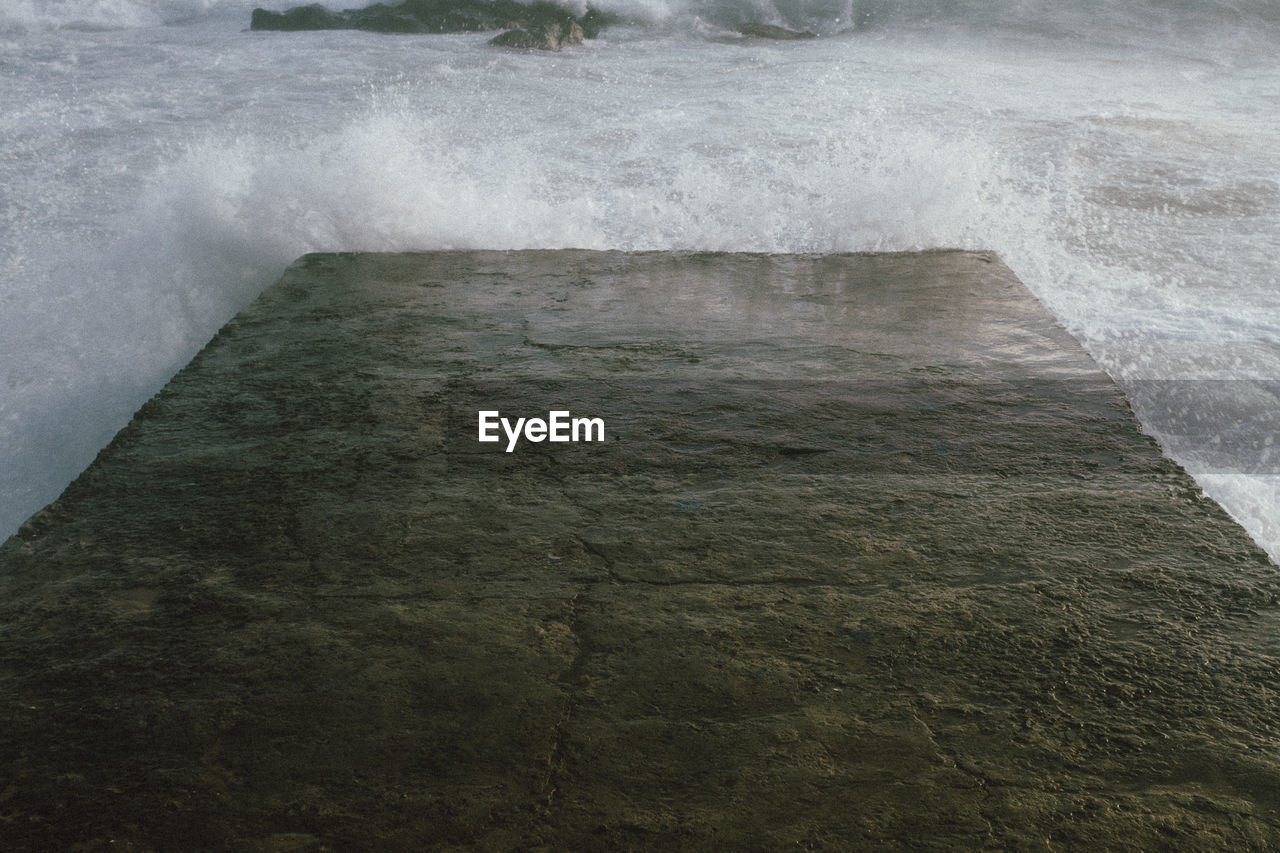 High angle view of waterfall in water