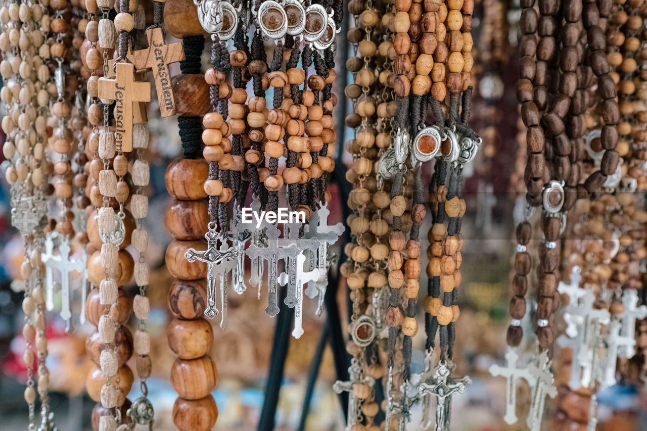 Close-up of rosaries for sale at market