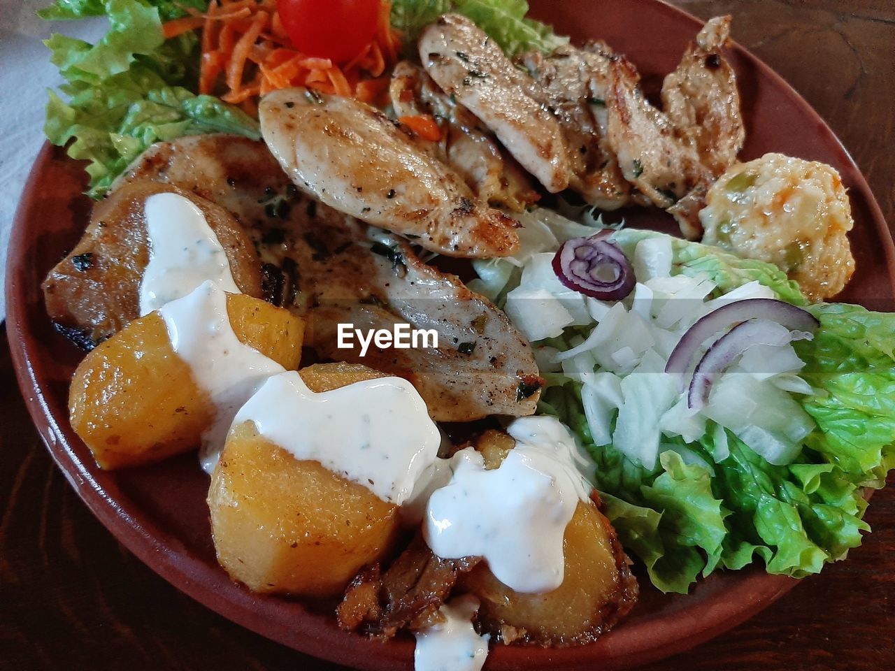 food, food and drink, healthy eating, freshness, salad, vegetable, wellbeing, meal, dish, no people, high angle view, appetizer, indoors, serving size, plate, lunch, table, still life, fruit, seafood, cuisine, close-up, meat, produce, fast food, tomato, breakfast, lettuce